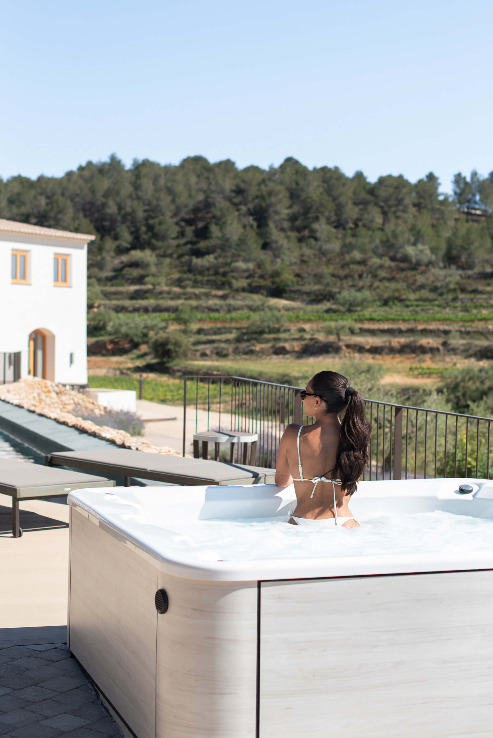 Woman in Hot Tub at Masia Cabellut Vineyard - Wellness Retreat Spain